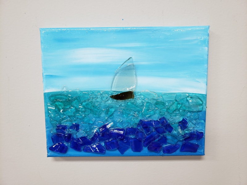 Sailboat on the water made with shattered glass
