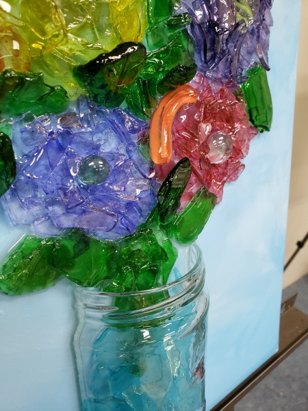 Mason Jar with Flowers with shattered glass